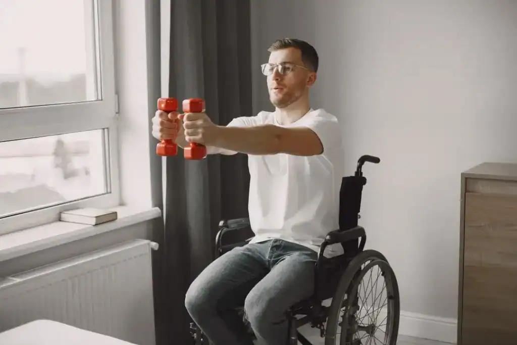 Image of man doing exercise in his wheelchair to aid weight loss Harwich