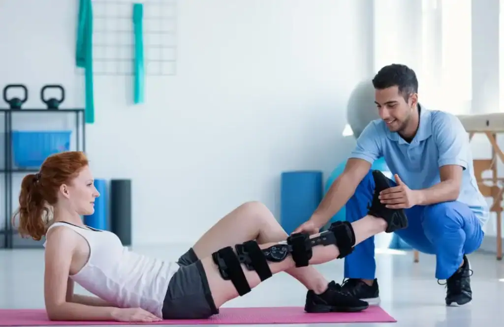 Woman having treatment to help muscle recovery Harwich after an injury