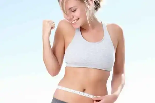 Unraveling the Mystery: Where Does the Body Fat Loss From First? 3 Image of woman happy with fat loss Harwich